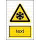 W017 - Nebezpečenstvo nízkej teploty - Zvislá nálepka s doplnkovým textom